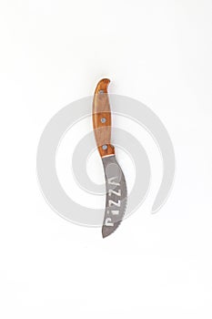 Kitchen chef knive for pizza laying on white background, flat lay, view from above, space for a text