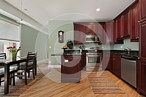 Kitchen with cherry wood cabinetry