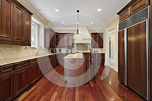 Kitchen with cherry wood cabinetry