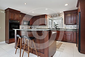 Kitchen with cherry wood cabinetry