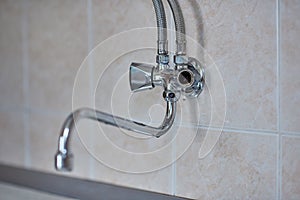 Kitchen chrome faucet is broken, horizontal view