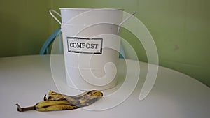 Kitchen compost pail. Sorting waste. Recycle kitchen scraps.