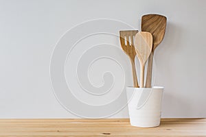 Kitchen cooking utensils; wooden spatulas etc. photo