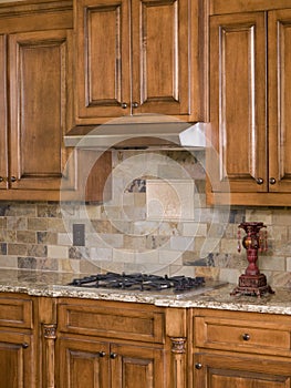 Kitchen cooktop and cabinets