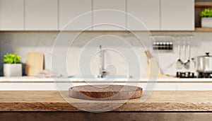 Kitchen counter with empty wooden board and blur modern kitchen interior background. Food and drink product podium stand tabletop photo
