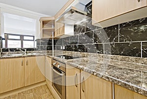 Kitchen counter with granite worktop