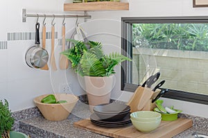 Kitchen counter with utensil prepared for cooking