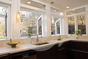 Kitchen countertop with many windows