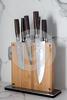 Kitchen Damascus Knife set on holder