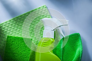 Kitchen dishrag sprayer sponge on white surface