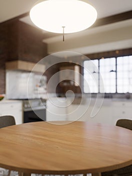 Kitchen with an emphasis on the surface of the kitchen table with a blurred background - a place to place products.