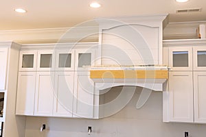 Kitchen furniture set installation in hanging cabinet