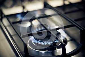 Kitchen gas cooker with burning fire propane gas