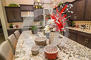 Kitchen With Granite Counters And Decorative Items