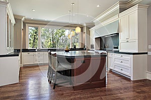 Kitchen with gray granite island