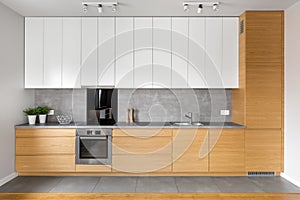 Kitchen with grey tiling