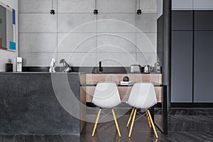 Kitchen with grey wall tiles photo