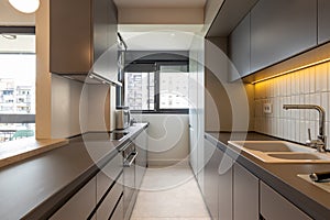 Kitchen interior with appliances in new apartment