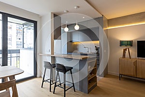 Kitchen interior with bar chairs and counter