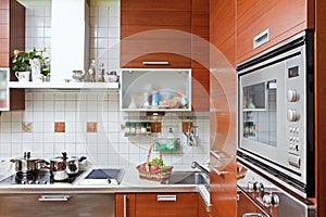 Kitchen interior with build in microwave oven