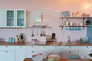 Kitchen interior with large dining table in modern apartment