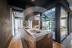 Kitchen interior in modern luxury penthouse apartment photo