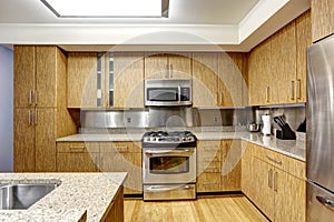 Kitchen interior with steel backsplash trim