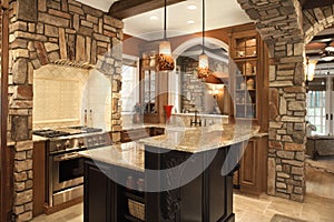 Kitchen Interior With Stone Accents in Affluent Ho