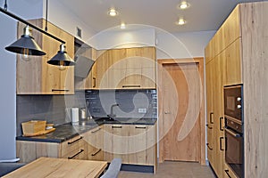 Kitchen interior in the style of modern minimalism with loft elements