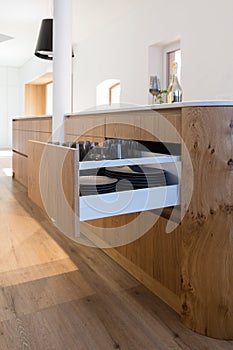 Kitchen island and opened drawer