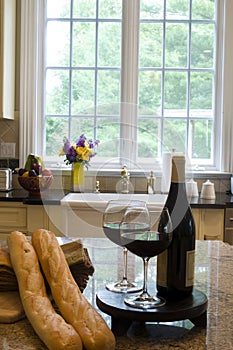 Kitchen island with wine baguettes photo