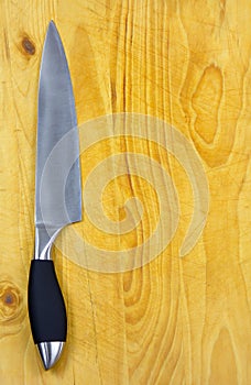 Kitchen Knife on Cutting Block.