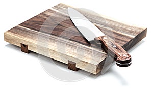 Kitchen Knife Lying On A Cutting Board, White Background