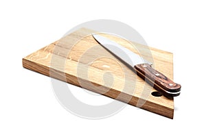 Kitchen Knife Lying On A Cutting Board, White Background