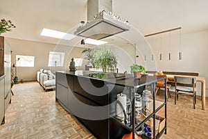 a kitchen with a large island and a dining room