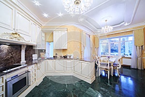 Kitchen with luxury furniture in classic style