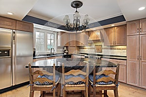 Kitchen with marble counter tops