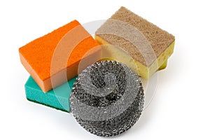 Kitchen metal and colored synthetic sponges on a white background