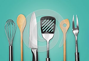 Kitchen metal and wooden utensil on background