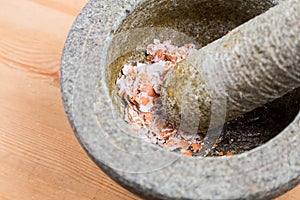Kitchen mortar and pestle with crashed egg shell