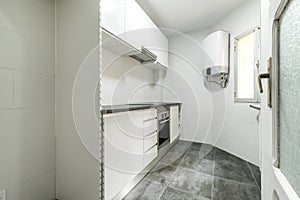 Kitchen with newly installed cabinets and drawers in a simple