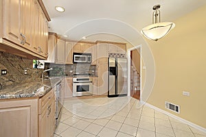 Kitchen with oak wood cabinetry