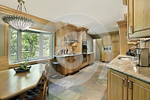 Kitchen with oak wood cabinetry