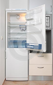 Kitchen with a open refrigerator