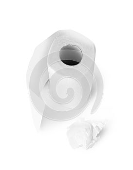 Kitchen paper towel roll and paper ball on a white back