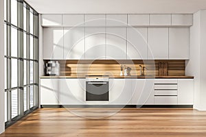 Kitchen room interior with oak wooden floor and electric cooker