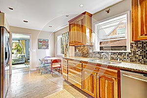 Kitchen room with mosaic back splash trim