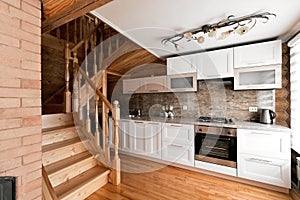 The kitchen room in a rustic log cabin, in the mountains. with a beautiful interior. house of pine logs