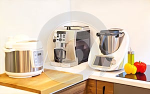 Kitchen`s modern machines. Automatic food processors, coffee machine and multi cooker.