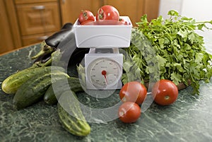 Kitchen scale and vegetables